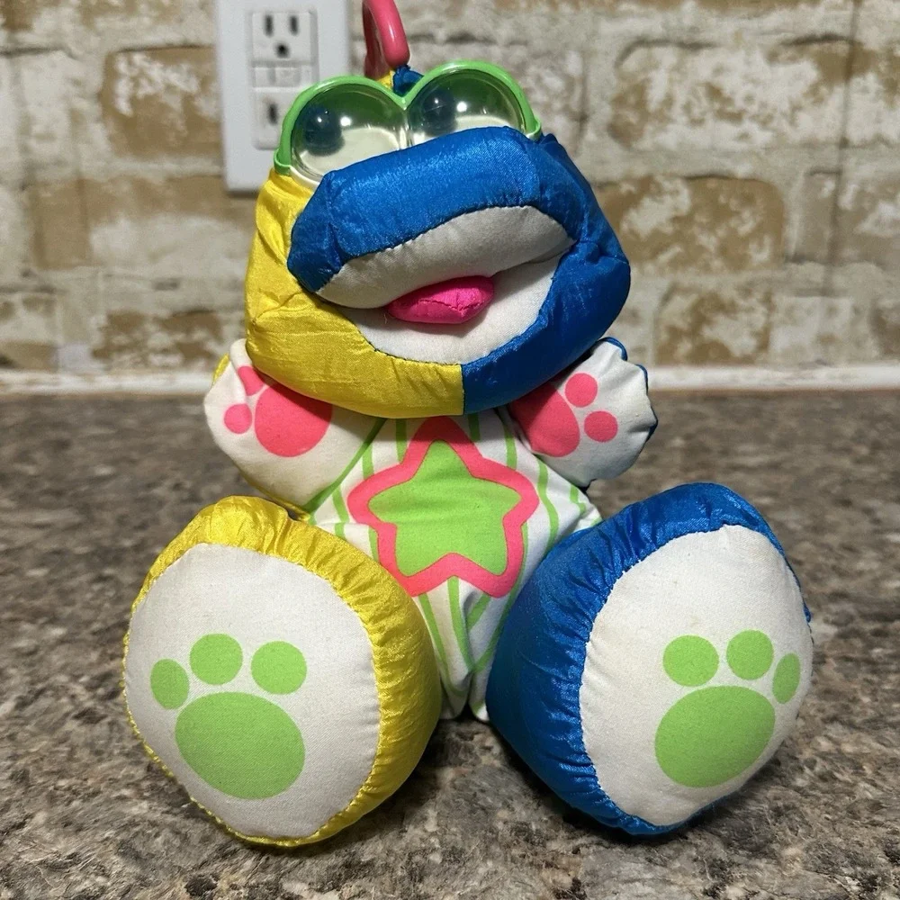 Fisher Price Puffalump Dinosaur Plush Stuffed Animal Toy Rattle Teether 1991
